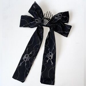 Piper K - Halloween Bow Barrette Skeleton Skull W/ Hands In Middle - One Size